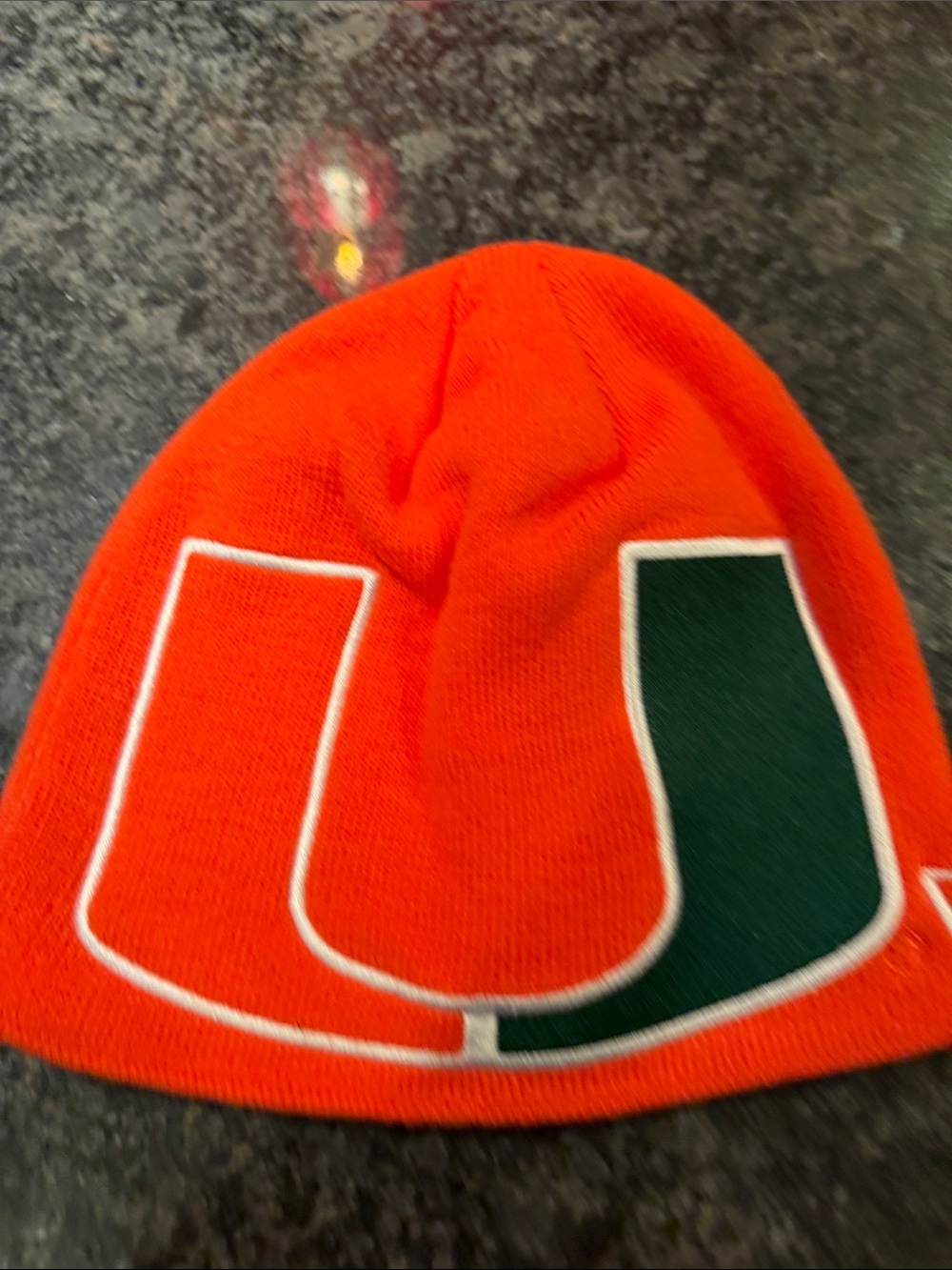 New Era Orange Knit Beanie with Green Logo